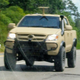 Illustration for article titled Check Out This Militarized Toyota Hilux and Its Weird Door Handles